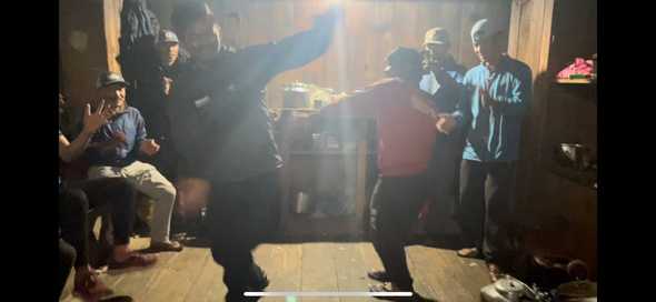 Guides and helpers dancing.